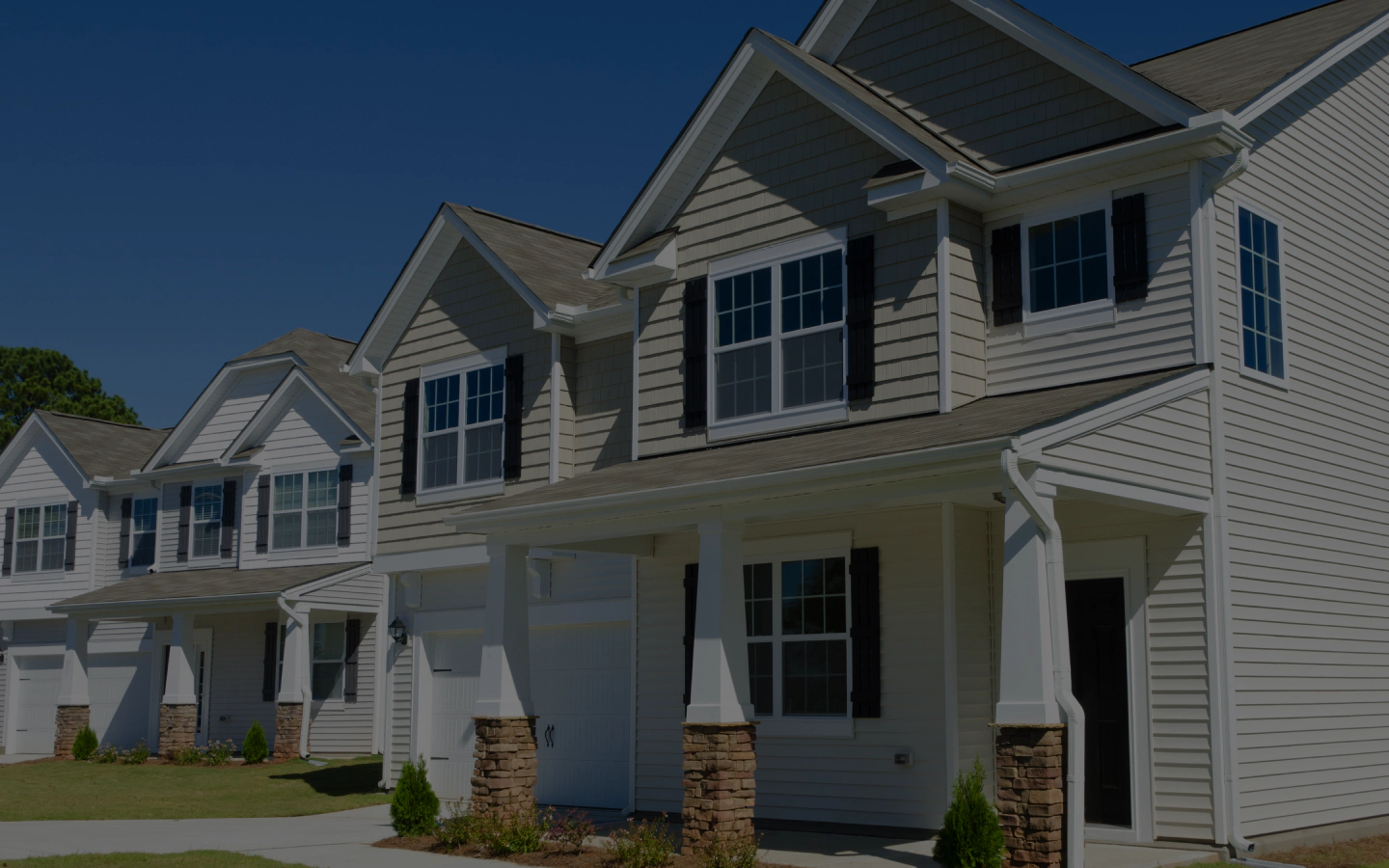 beautiful house with perfectly installed siding roofing and gutters