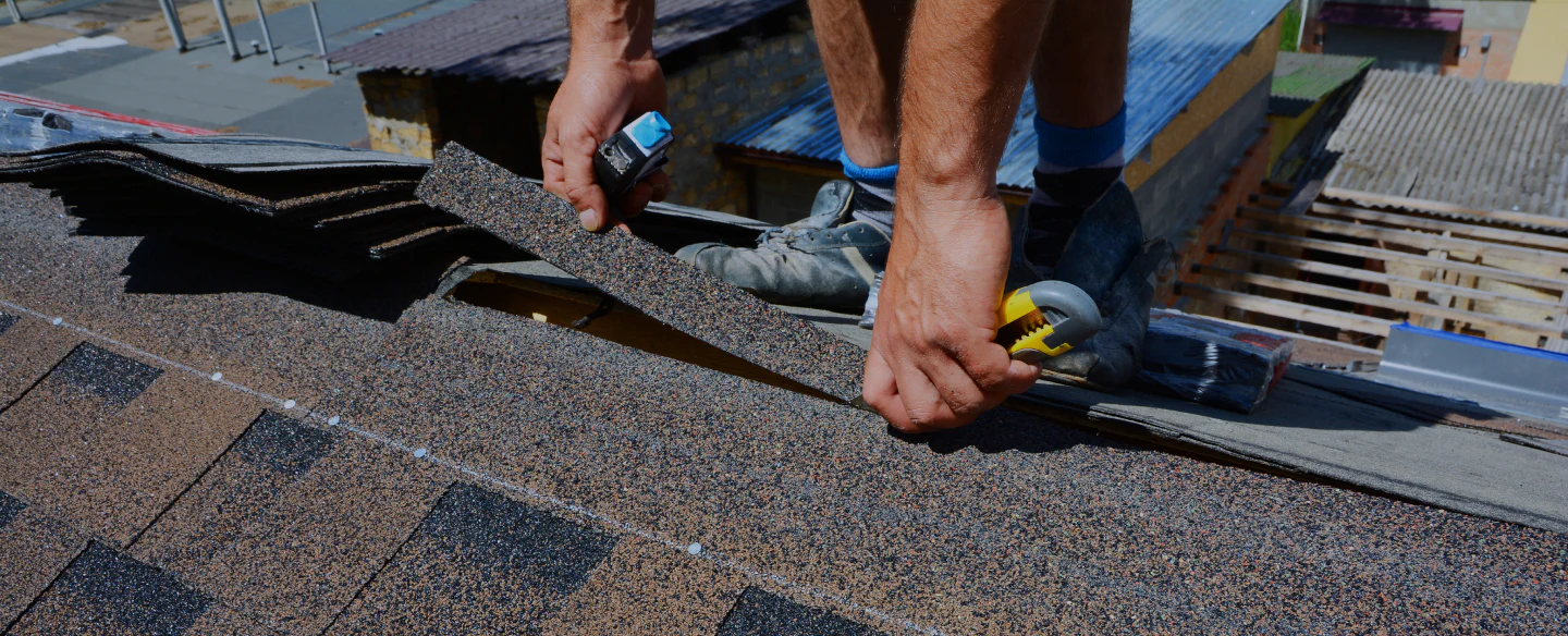 man installing asphalt shingle roofing (1)